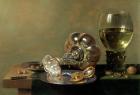 A still life with glass of wine, tazza and a pewter plate