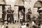 Police gathered behind a 'Help Wanted' sign, 2004 (b/w photo)