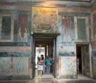 Istanbul, Turkey. Byzantine Church of St. Saviour in Chora. Visitor entering the Nave. Above her the mosaic showing The Dormition of the Virgin. The death of the Virgin Mary.