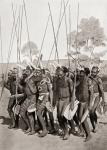 An avenging expedition by a northern tribe of Central Australia. The men danced just before leaving to take vengeance on another group of natives for the death of a relative. Whenever a death occurred it was believed to be due to magic, and it was the dut