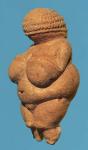 The Venus of Willendorf, side view of female figurine, Gravettian culture, Upper Palaeolithic Period, c.30000-18000 BC (oolitic limestone coloured with red ochre) (for detail see 93777)