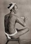 A tattooed Japanese man in the 19th century. Tattooing was a mark of low breeding and vulgarity in Japan, only coolies whose work necessitated stripping the body ever had their bodies tattooed. After a 19th century photograph. From Customs of The World, p
