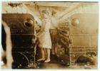 Elsie and Sadie working at Yazoo City Yarn Mills, Mississippi said they were 13 years old, 1911 (b/w photo)