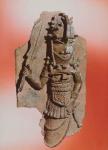 Plaque depicting the royal god Oba holding the eben sword in his right hand, dancing to honour his ancestors, Benin, possibly 16th century (brass)