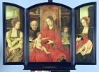 The Holy Family with St. Catherine and St. Barbara, triptych (tempera on panel)