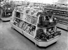 Biscuit aisle, Woolworths store, 1956 (b/w photo)