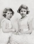 Queen Elizabeth II, right, as a princess circa. 1937 and Princess Margaret, left. From The Coronation of their majesties King George VI and Queen Elizabeth, Official Souvenir Programme published 1937