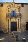 Facade of the Palace of the Marquis of Salvatierra with paired figures in pre-Columbian style, Ronda, Malaga Province, Andalusia, Southern Spain (photo)