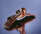 Cauldron handle, bird with the torso of a woman (bronze)