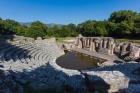 Albania. Butrint or Buthrotum archeological site; a UNESCO World Heritage Site. The theatre. A rising water table has flooded the orchestra. (photo)