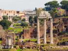 The Roman Forum, the three columns of the Temple of Castor and Pollux and the Arch of Titus in the background, Rome, Italy (photo)