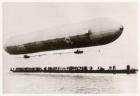 The first flight of the prototype airship Zeppelin LZ1, shown above a boat on Lake Constance, Friedrichshafen, 2nd July 1900 (b/w photo)
