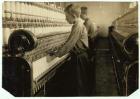 Doffers replacing full bobbins at Indian Orchard Cotton Mill, Massachusetts, 1916 (b/w photo)