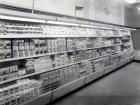 Cake and pudding mixture aisle, Woolworths store, 1956 (b/w photo)