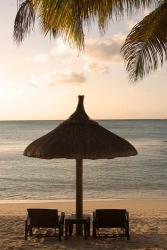 Mauritius, Beach scene, umbrella, chairs, palm fronds | Obraz na stenu