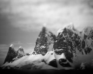 Antarctica, Mountain peaks along Cape Renaud in Lemaire Channel. | Obraz na stenu
