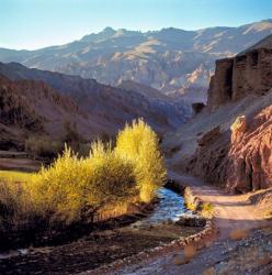Afghanistan, Bamian Valley, Dirt road and stream | Obraz na stenu