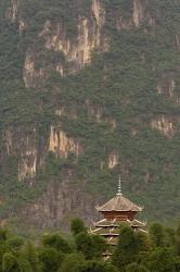 Pagoda and giant karst peak behind, Yangshuo Bridge, China | Obraz na stenu