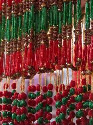 Beads hang in a store in Kathmandu, Nepal. | Obraz na stenu