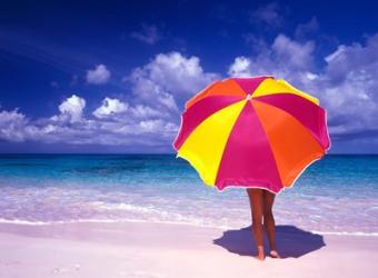 Female Holding a Colorful Beach Umbrella on Harbour Island, Bahamas | Obraz na stenu