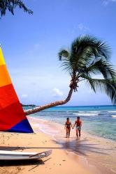 Couple on Beach with Sailboat and Palm Tree, Barbados | Obraz na stenu