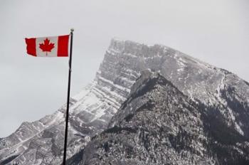 Canada, Alberta, Banff Mountain view with flag | Obraz na stenu