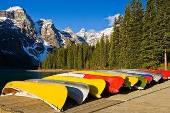 Moraine Lake and rental canoes stacked, Banff National Park, Alberta, Canada | Obraz na stenu
