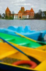 Colorful Boats and Island Castle by Lake Galve, Trakai, Lithuania | Obraz na stenu