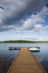 Lithuania, Grutas, lake and pier | Obraz na stenu