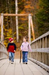 Children on suspension bridge New Hampshire | Obraz na stenu