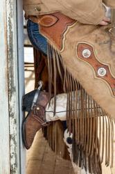 Cowgirl Standing In Doorway Of Old Log Cabin | Obraz na stenu