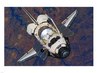 The Space Shuttle Discovery approaches the International Space Station | Obraz na stenu