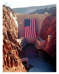 Hoover Dam with large  American flag | Obraz na stenu