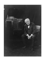 Thomas Edison, seated beside phonograph | Obraz na stenu