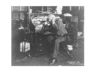 Thomas Alva Edison using his dicatating machine | Obraz na stenu