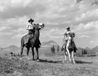 Pair Of Cowboys On Horseback At Glacier Fifty Mountain Camp | Obraz na stenu