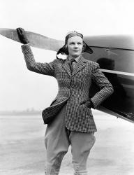 1930s Woman Aviator Pilot Standing Next To Airplane | Obraz na stenu