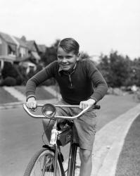 1930s Smiling Boy Riding Bicycle | Obraz na stenu