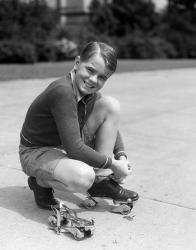 1930s Smiling Boy Fastening On Metal Roller Skates | Obraz na stenu