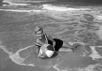 1960s Woman In Bathing Suit Lying In The Surf | Obraz na stenu