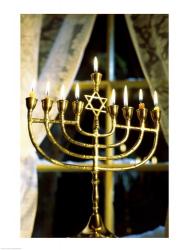Close-up of lit candles on a menorah | Obraz na stenu