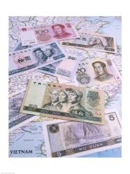 Close-up of yuan notes on a map | Obraz na stenu