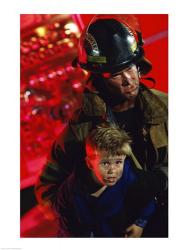 Close-up of a firefighter carrying a boy | Obraz na stenu