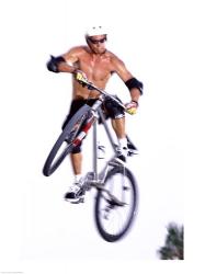 Young man on a bicycle in mid-air | Obraz na stenu