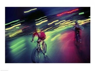 Young man riding a bicycle | Obraz na stenu