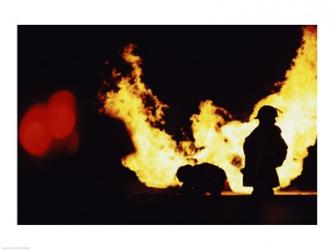 Firefighters extinguishing a fire | Obraz na stenu