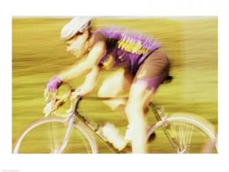 Side profile of a young man cycling | Obraz na stenu