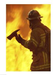 Side profile of a firefighter holding an axe | Obraz na stenu
