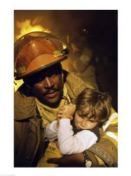 Firefighter carrying a boy | Obraz na stenu