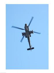 Low angle view of a military helicopter in flight | Obraz na stenu